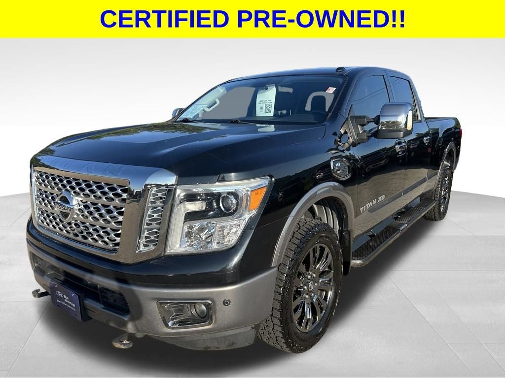 2017 Nissan TITAN XD Platinum Reserve Diesel in Magnetic Black — front three-quarter view