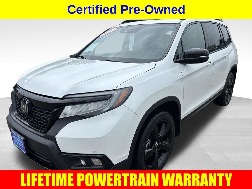 2021 Honda Passport AWD Elite in White — front three-quarter view
